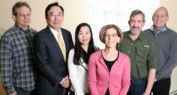 The extracellular RNA in colorectal cancer team includes, from left, Jeffrey Franklin, PhD, Yu Shyr, PhD, Qi Liu, PhD, Alissa Weaver, MD, PhD, James Higginbotham, PhD, and James Patton, PhD. Not pictured: Robert Coffey, MD, Kasey Vickers, PhD, and John Karijolich, PhD. (photo taken before social distancing)