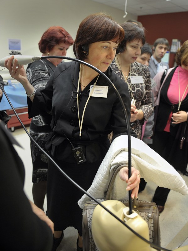 Irina Ivanova gets some hands-on experience during the Russian delegation’s visit to the Center for Experiential Learning and Assessment. (photo by Joe Howell)