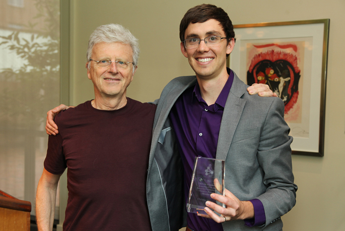Christian Meyer, right, a graduate student in the lab of Vito Quaranta, MD, left, received the 2019 Richard Armstrong Prize for Research Excellence last week during the Vanderbilt Institute of Chemical Biology Student Research Symposium. The prize is named for the late Richard Armstrong, PhD, professor of Biochemistry and Chemistry, who died in 2015. Meyer’s winning project was titled, “A consensus framework for calculating drug synergy.” Quaranta, professor of Biochemistry and Pharmacology, directs the Vanderbilt Quantitative Systems Biology Center.