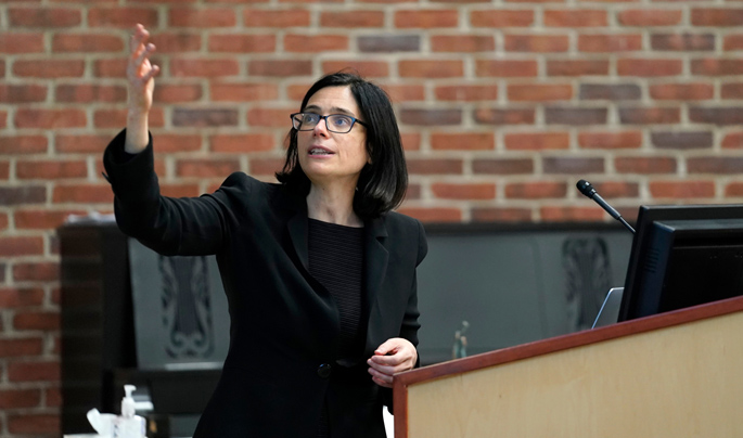 Aviv Regev, PhD, recipient of the 2021 Vanderbilt Prize in Biomedical Science, gestures to an illustration during her Vanderbilt Prize Discovery Lecture on April 14.