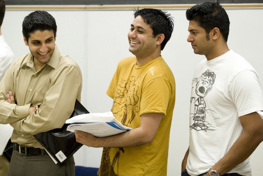 Sumeer Thinda, M.D., left, Neil Jariwala, M.D., and Reddy Sankrant, M.D., share a laugh during house staff orientation.