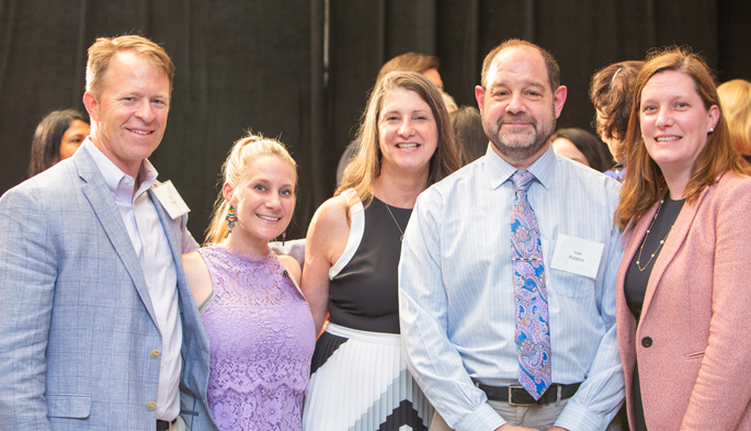 Betsy Barbour, center, with members of her husband Richard’s care team. From left are Eric Grogan, MD, MPH, Jennifer Gray, PharmD, Ivan Robbins, MD, and Ciara Shaver, MD, PhD. 