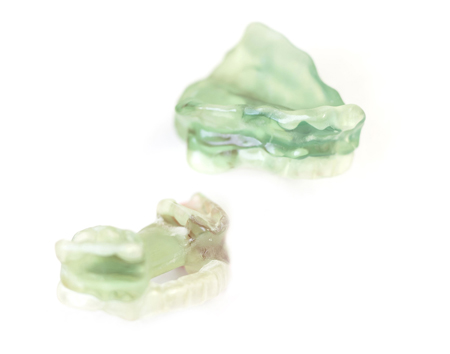 Custom mouthpieces such as these help protect head and neck cancer patients during radiation treatments. 