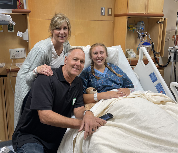 liver transplant patient Lucy Sherba with her mother, Christian Sherba, and father, Chris Scherba, on the day of her surgery.