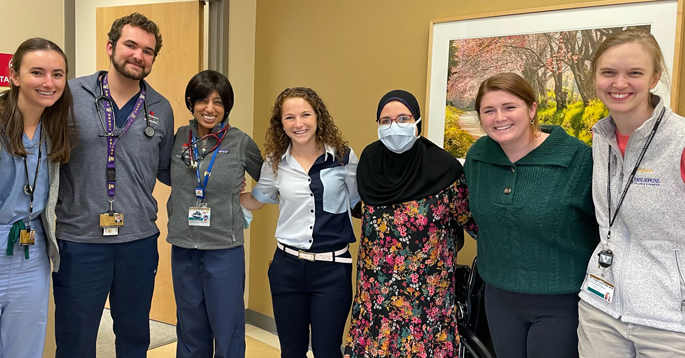From left, Shade Tree Clinic volunteers and medical students Jessica Hanks and Alex Landry; medical director Maya Neeley, MD; co-director of the pediatric clinic, Simone Herzberg; medical student Nada Elyssad; co-director of the pediatric clinic, Shauna McLaughlin; and medical director Cooper Lloyd, MD, at the opening of the Shade Tree pediatric clinic.