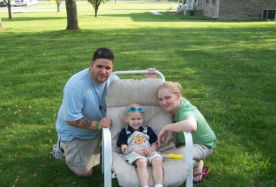 Becky Evreniadis, here with her son, Jamie, and husband, James, was inspired to join the 46 Mommas by Jamie’s fight against cancer. Jamie died in 2006. (photo courtesy of Becky Evreniadis)