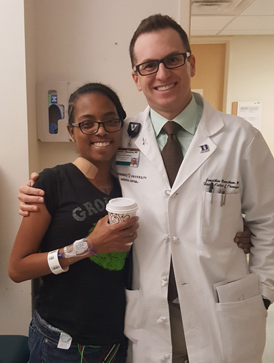 Patient Deja Baynard-Watson poses with Jonathan Menachem, MD.