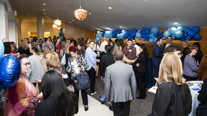 Following the Strategy Share 2023 presentations, a networking reception was held in the Langford Auditorium lobby to celebrate achievements and encourage further collaboration. (photo by Susan Urmy)