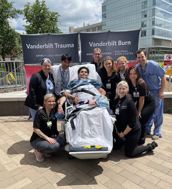 Darinel Castillo, a patient in Vanderbilt University Medical Center’s Trauma Intensive Care Unit, participated in the recent National Trauma Survivors Day, surrounded by members of his care team.