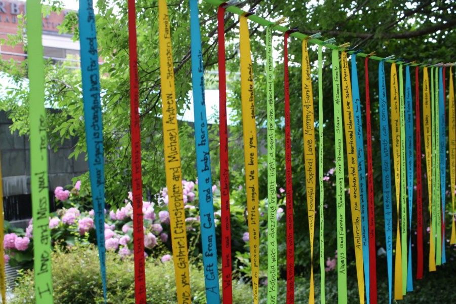 Ribbons with inspirational messages by family members were hung in the Friends Garden. (photo by Jeremy Rush)