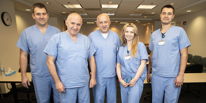 The Ukrainian medical team included, from left, Serhii Sudakevych, MD, Borys Todurov, MD, Igor Kuzmych, MD, Sofia Chaikovska, MD, and Mykola Melnyk, MD. (photo by Erin O. Smith)