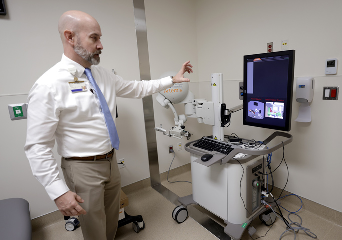 Russell Kunic, MSN, FNP-BC, NE-BC, talks about new features in Vanderbilt Urology’s newly renovated TVC clinic. (photo by Donn Jones)