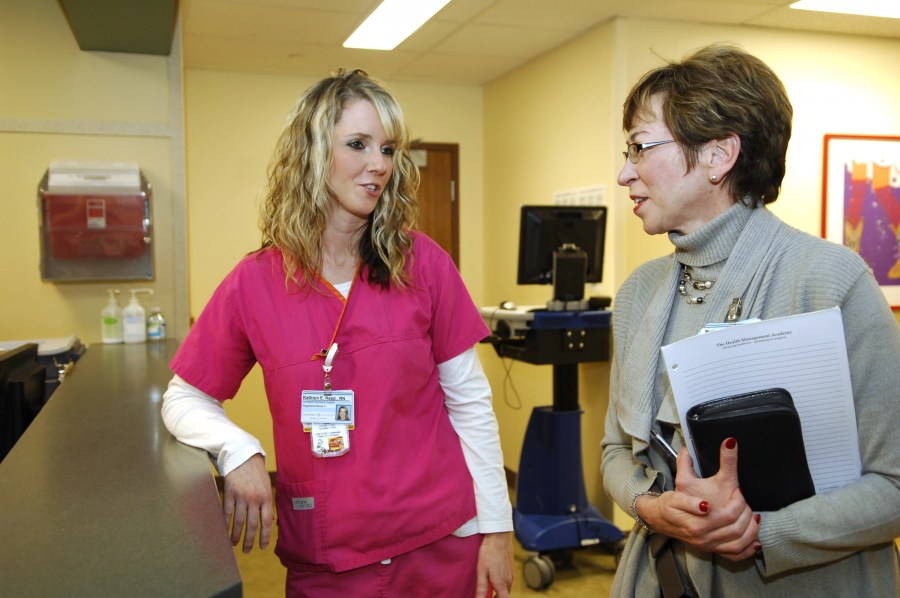 Executive Chief Nursing Officer Marilyn Dubree, MSN, R.N., right, talks with Kathryn Rapp, R.N., during a recent rounding visit at the Vanderbilt Psychiatric Hospital. (photo by Anne Rayner)