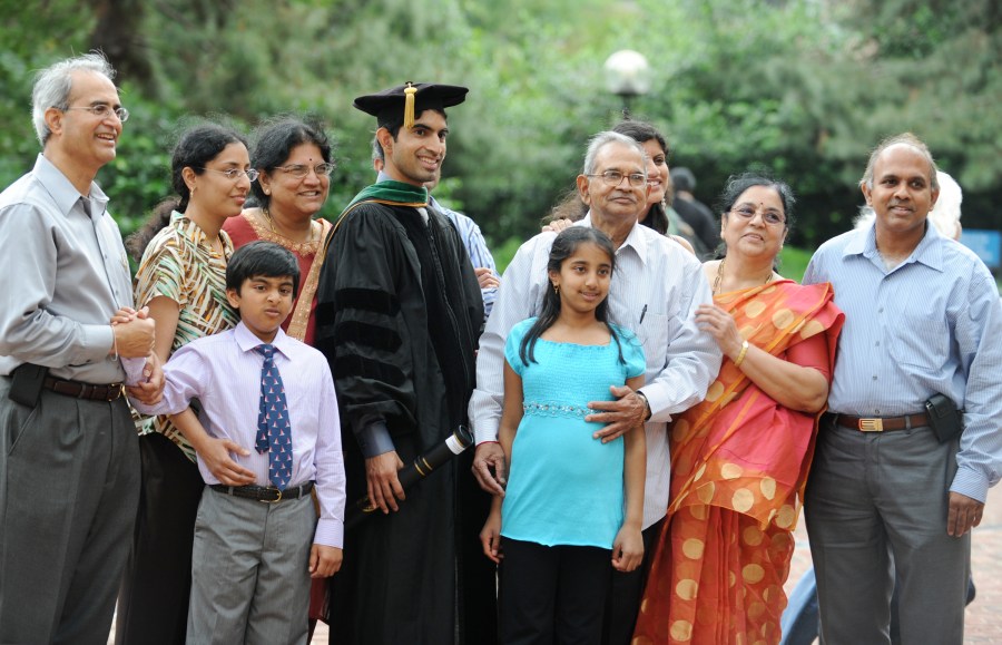 Mohan Mallipeddi celebrates with some of the 14 family members who traveled from California and India to see him graduate from the School of Medicine. (photo by Joe Howell)