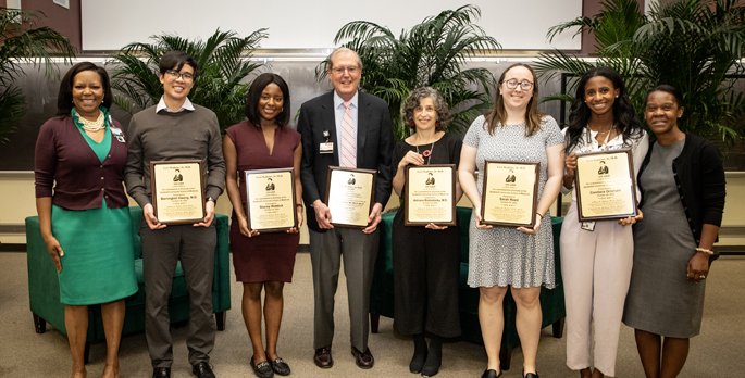 Consuelo Wilkins, MD, MSCI, far left, John Sergent, MD, MACP, MACR, center, and Kimberly Vinson, MD, far right, with award winners Barrington Hwang, MD, left, Stacey Riddick, Adriana Bialostozky, MD, Sarah Reed and Candace Grisham. (photo by Erin O. Smith)