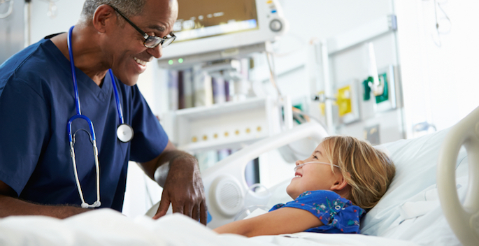 doctor and pediatric patient in ICU