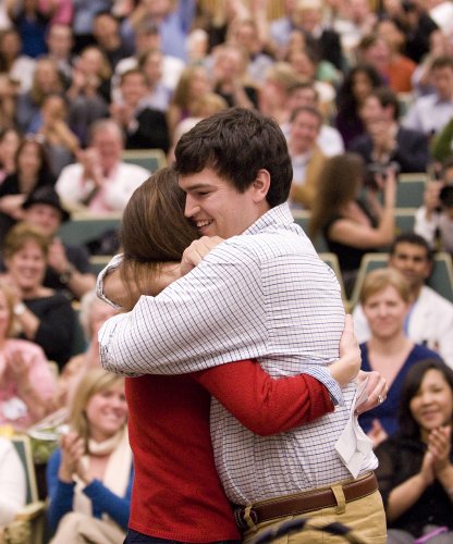 Samuel Crosby hugs his wife,  Amy, after matching at Vanderbilt. (photo by Joe Howell)