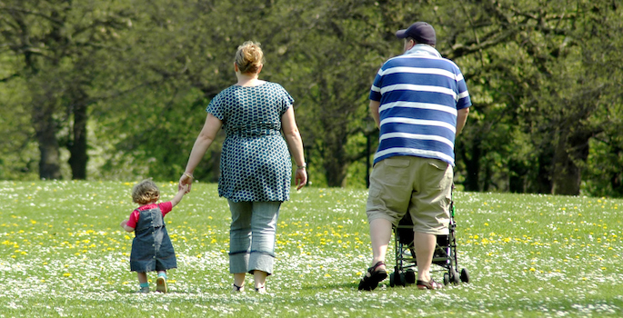 Overweight or obese family in the park