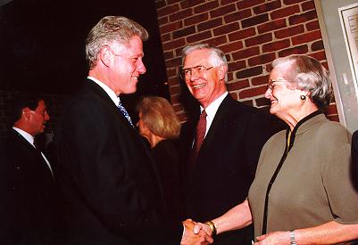 Ann and Dr. Roscoe R. Robinson, Vice Chancellor for Health Affairs, greet President Clinton at Light Hall.