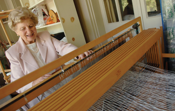 Sell enjoys her longtime hobby, weaving, at her home in Nashville. Photo by Dana Johnson