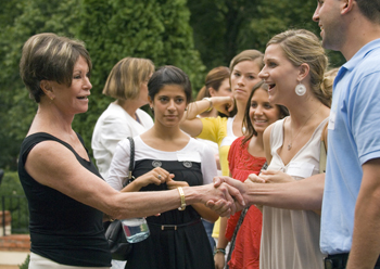 VUSN Dean Colleen Conway-Welch, Ph.D., shares a laugh with Lindsey Piper and other new students as they arrive at the picnic she hosts during first week of school. (photo by Dana Johnson)