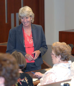 Mary Hance, aka Ms. Cheap, gives money-saving tips during her talk last week. (photo by Neil Brake)