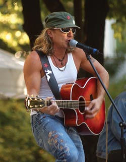 Singer/Songwriter Jeffrey Steele performs during the Employee Celebration Month finale last Friday afternoon. 
photo by Dana Johnson