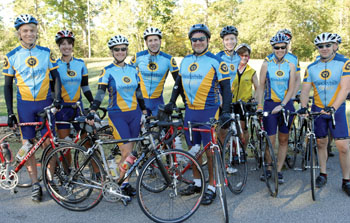 The cycling team includes, from left, Kevin Leander, Ph.D., Sonia Scalf, R.N., Lori Zulfer, R.N., Mark Robbins, M.D., James Martinez, Margaret Morrison, Dawn Sabin, R.N. (second from right), and Mike Marlow. (photo by Neil Brake)