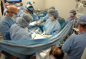 The Advanced Maternal-Fetal Care surgical team performs the newly developed fetal surgery procedure on patient Yolanda Stone. (photo by Neil Brake)