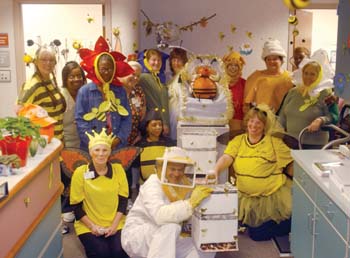 Adult Primary Care Center Suite IV staff members have a honey of a good time with their bee-themed costumes and decorations at their Halloween costume contest Tuesday.
Photo by Susan Urmy