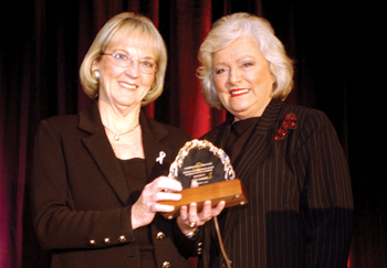 Anna Barker, Ph.D., (left) deputy director for Strategic Scientific Initiatives at the National Cancer Institute, receives the Frances Williams Preston Award for Breast Cancer Awareness from Preston, president and CEO of performing rights organization BMI. Dana Johnson
