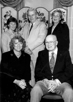 Allan Bass, M.D., bottom right, with some of his successors as chair of Pharmacology, including Heidi Hamm, Ph.D., seated, and, from left, Elaine Bush, Ph.D., Joel Hardman, Ph.D., and Lee Limbird, Ph.D.