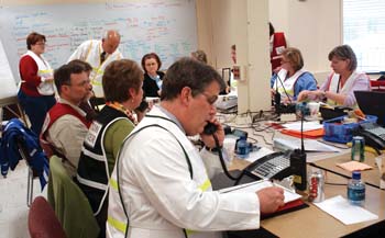 C. Wright Pinson, M.D., was among faculty and staff in the VUMC Emergency Operations Center during last April’s diaster preparedness exercise. The drill was halted in response to the violent storms on April 7.
Photo by Dana Johnson