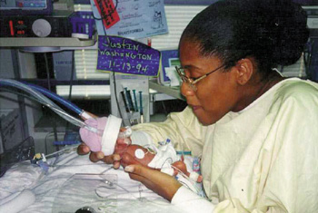 In 1994, Dorenda Washington held Justin, who was born four months premature and weighed only 
1 pound, 8 1/2 ounces.