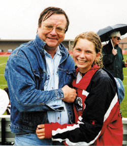 Strauss hugs daughter Lara after a rugby match. Lara played rugby for the U.S. Rugby Team.