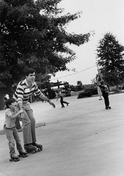 Norm and son Matt practice their rollerskating techniques at the VUMC picnic in 1983.