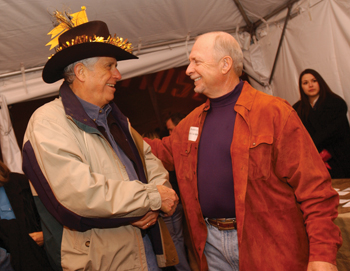 Harry Jacobson, M.D., right, congratulates Hal Moses, M.D., at the ‘Steppin’ Down Hoedown’ honoring Moses.
photo by Dana Johnson