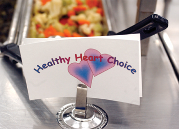 Signs mark Healthy Heart choices in the cafeteria line at Stratton Elementary School, one of the participating schools in the Healthy Heart Project. 