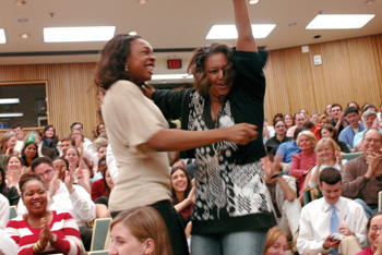 Mercy Udoji, left, and Rosyalyn Porter celebrate during Thursday’s Match Day event. (photo by Dana Johnson)