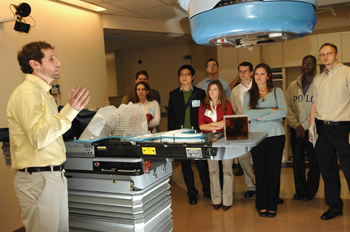 Radiation therapist Dustin Jordan conducts a tour of Radiation Oncology. (photo by Anne Rayner)