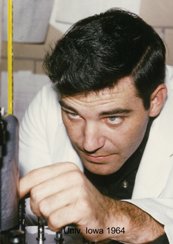 Billy Hudson, Ph.D., concentrates on his research at the University of Iowa in 1964.