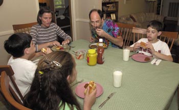 Finder enjoys a casual meal with wife Cindy and children Nathan, 9, and twins Sam and Sarah, 10. (photo by Neil Brake)