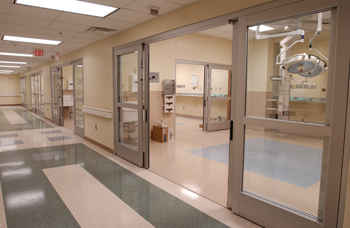 The new Emergency Department’s four state-of-the-art trauma bays come equipped with operating room-quality lighting and medical gasses that drop from the ceilings.
photo by Dana Johnson