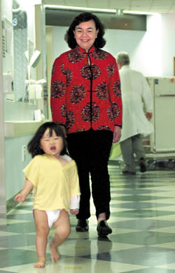 No stopping her now.  Lin Lin, now named Kaitlyn, runs the halls of Vanderbilt Children’s Hospital only days after her surgery. (photo by Dana Johnson)