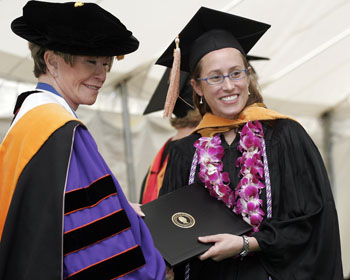 Jennifer Johnson receives her diploma from Dean Colleen Conway-Welch, Ph.D.
Photo by Kats Barry