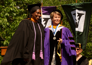 Colleen Conway-Welch, Ph.D., dean of the Nursing School, presents a Founder’s Medal to Tanya R. Sorrell.