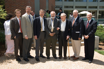 Peter Wright, M.D., center poses with colleagues who celebrated his career during a symposium last week at the Vanderbilt Student Life Center. From left are James Crowe, M.D., Barney Graham, M.D., Ph.D., William Gruber, M.D., Wright, David Karzon, M.D., Warren Johnson, M.D., and Philip Johnson, M.D. (photo by Mark Denison)