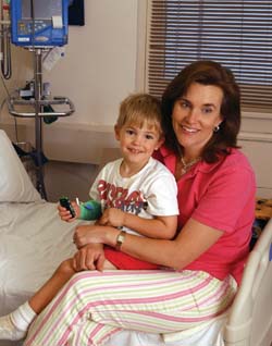 Oliver Gould, here with his mother, Ellen, is taking part in a study of a treatment to prevent the onset of type 1 diabetes. (photo by Susan Urmy)