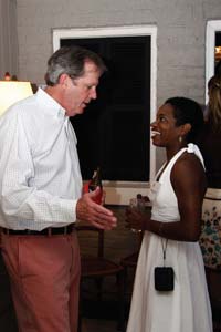 John Sergent, M.D., chats with Harvard Medical School graduate and new resident Monique Anderson, M.D., at a reception for incoming Internal Medicine house staff.
Photo by James Smith, M.D.