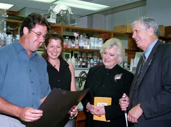Vince Gill and Amy Grant joined Frances Preston and Dr. Hal Moses for a tour of the laboratories supported by the T.J. Martell Foundation that bear Preston's name. 